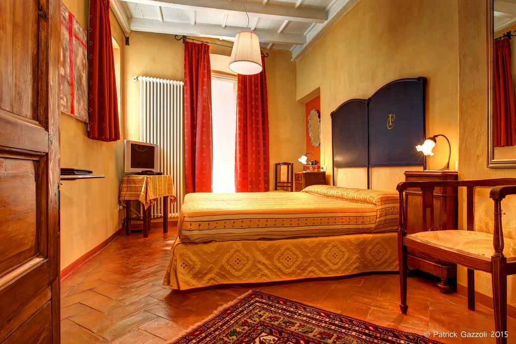 Hotel Il Cortile كانيرو ريفييرا الغرفة الصورة